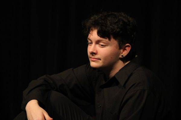 Andrew Cusmano performing his monologue in West Highs 2023 Spring Play Dear Chuck.