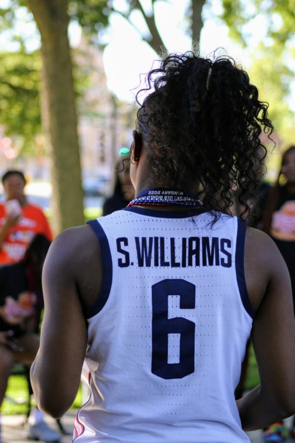 Sahara Williams sports her jersey for the 18U 3v3 USA girls basketball team during her parade. 