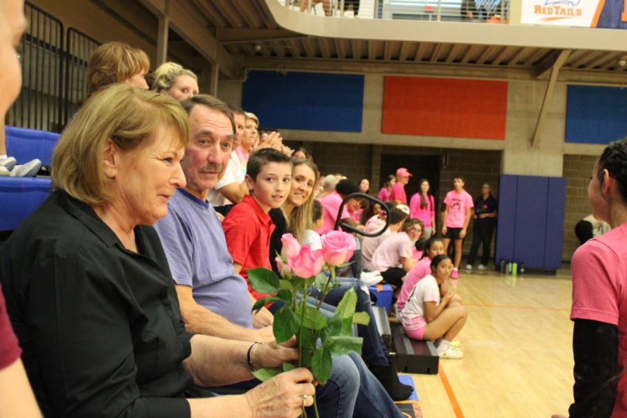 Emotional moment after roses were given at volleyball Senior Night. 