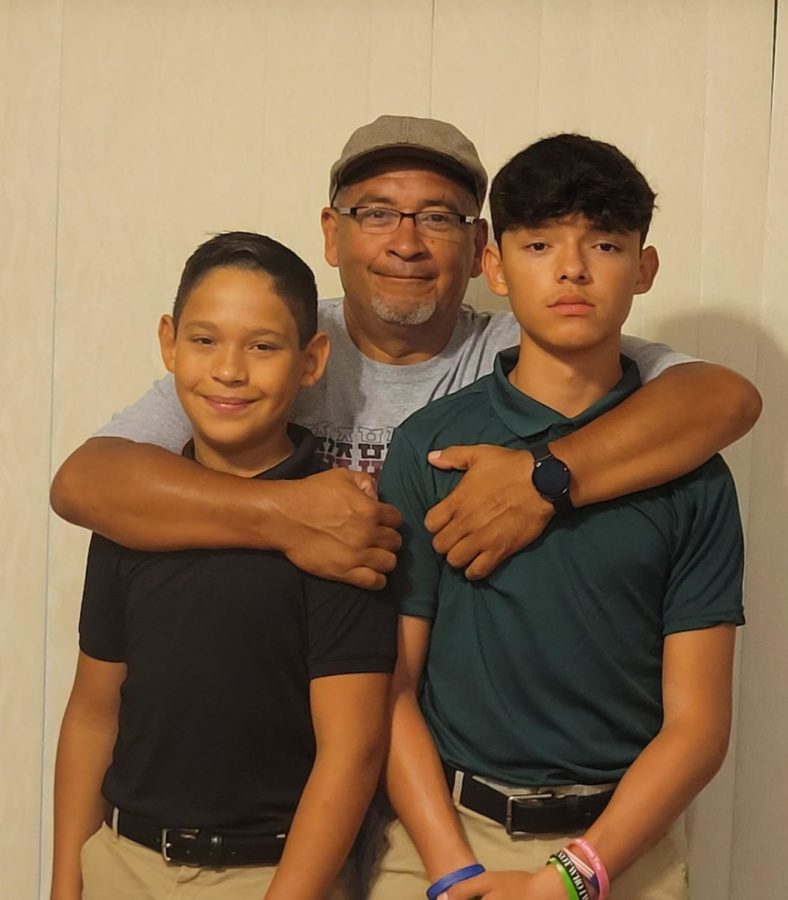 Berumez with his two sons.