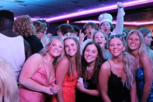 Students pose with the prom queen, McKenna Anders, right after being crowned. 