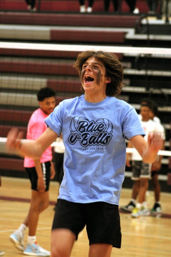 Senior Brenner Ortman shouts enthusiastically after his team Blue V-Balls wins a game.