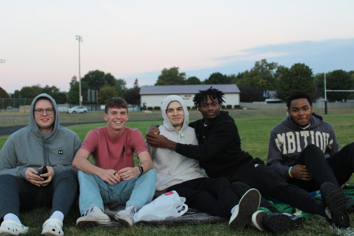 Seniors Dian West, Brady Wellborn, Kyle Gefaller, Jaone Arterberry, and Keon Lawrence posing for a picture at senior sunrise on September 15th, 2023.