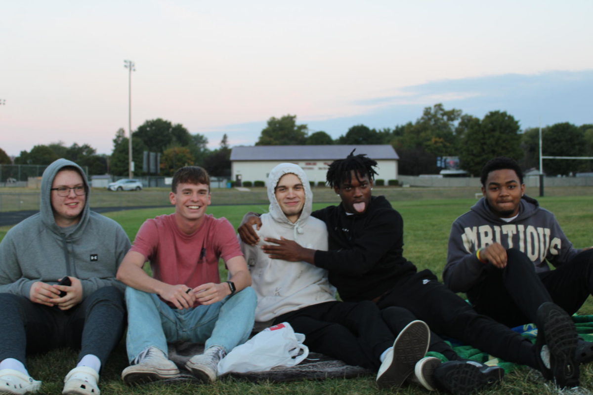 Seniors Dian West, Brady Wellborn, Kyle Gefaller, Jaone Arterberry, and Keon Lawrence posing for a fun picture at senior sunrise on September 15th, 2023.