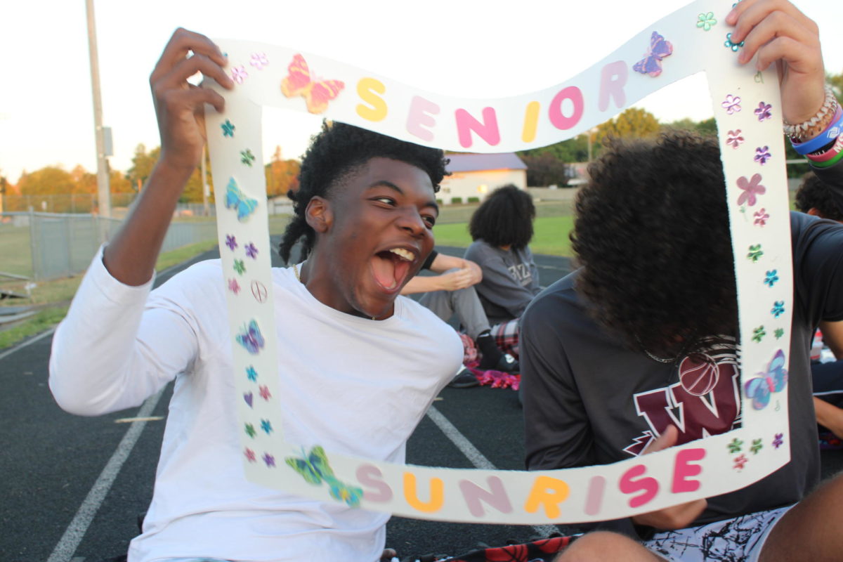 Shuncere Wortham laughing before having his picture taken at senior sunrise on September 1st, 2023.