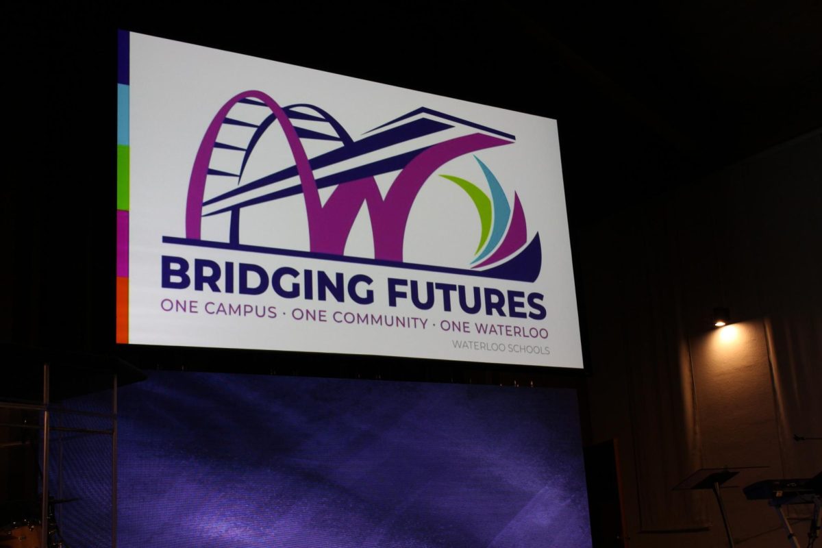 The Waterloo Schools slogan of "Bridging Futures. One Campus. One Community. One Waterloo."