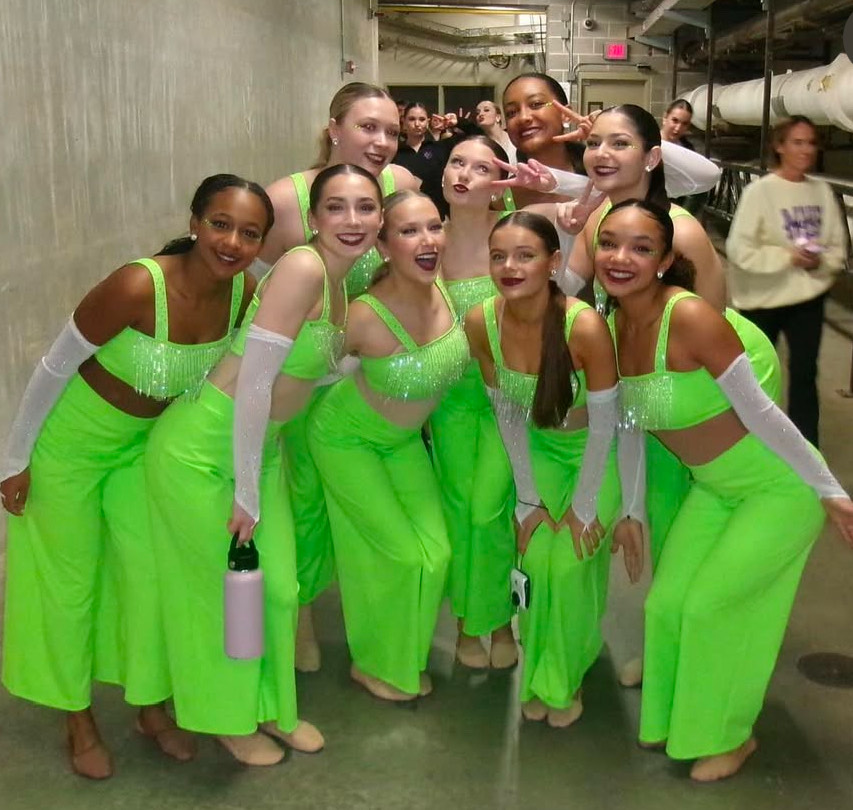 West High Dance Team poses for photo in Jazz Costumes