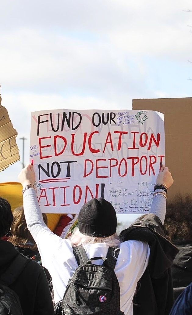 Students of Waterloo West High march in lines on the sidewalks of Ridgeway and curved around into the surrounding neighborhoods. They held signs and chanted loud to be heard by pedestrians or cars driving by. 