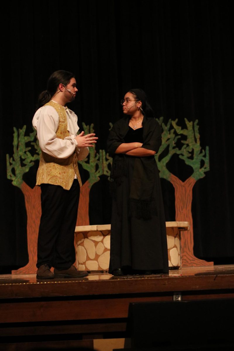 Seniors Delphi Dixon and Kyle Squire performing in the fall play "The Legend of Sleepy Hollow."